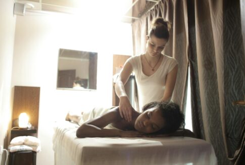 A serene massage therapy session in a comfortable wellness setting, enhancing relaxation.