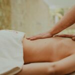 A soothing massage therapy session in a tranquil spa setting focusing on relaxation and wellness.