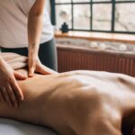 A soothing massage session in a warm indoor setting promoting relaxation and self-care.