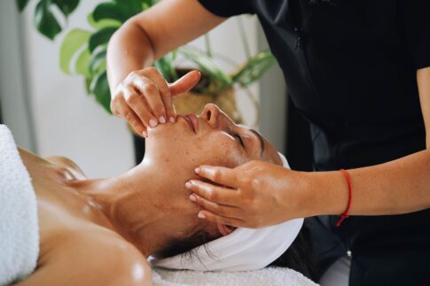 Enjoy a calming facial massage promoting wellness and relaxation at a luxurious spa.