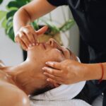 Enjoy a calming facial massage promoting wellness and relaxation at a luxurious spa.